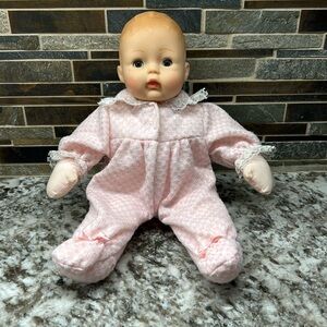 Madame Alexander pink check baby huggums doll, very good.